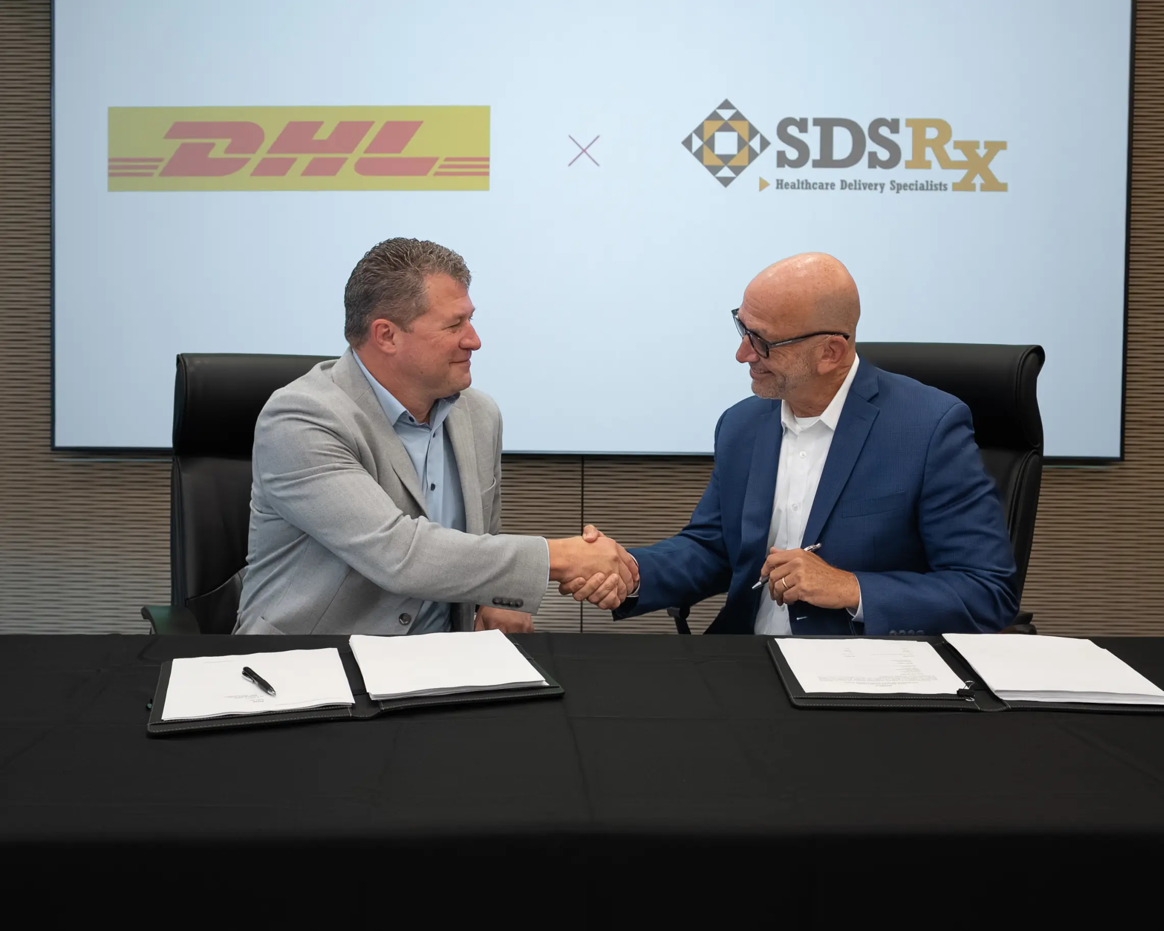Mark Kunar za DHL a Drew Kronick za SDS Rx © DHL